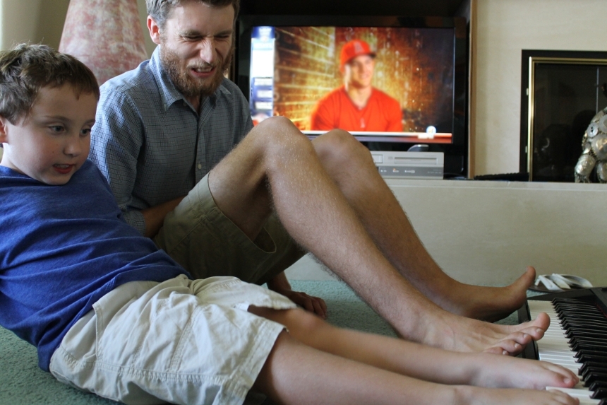 Playing-piano-together-feet-2